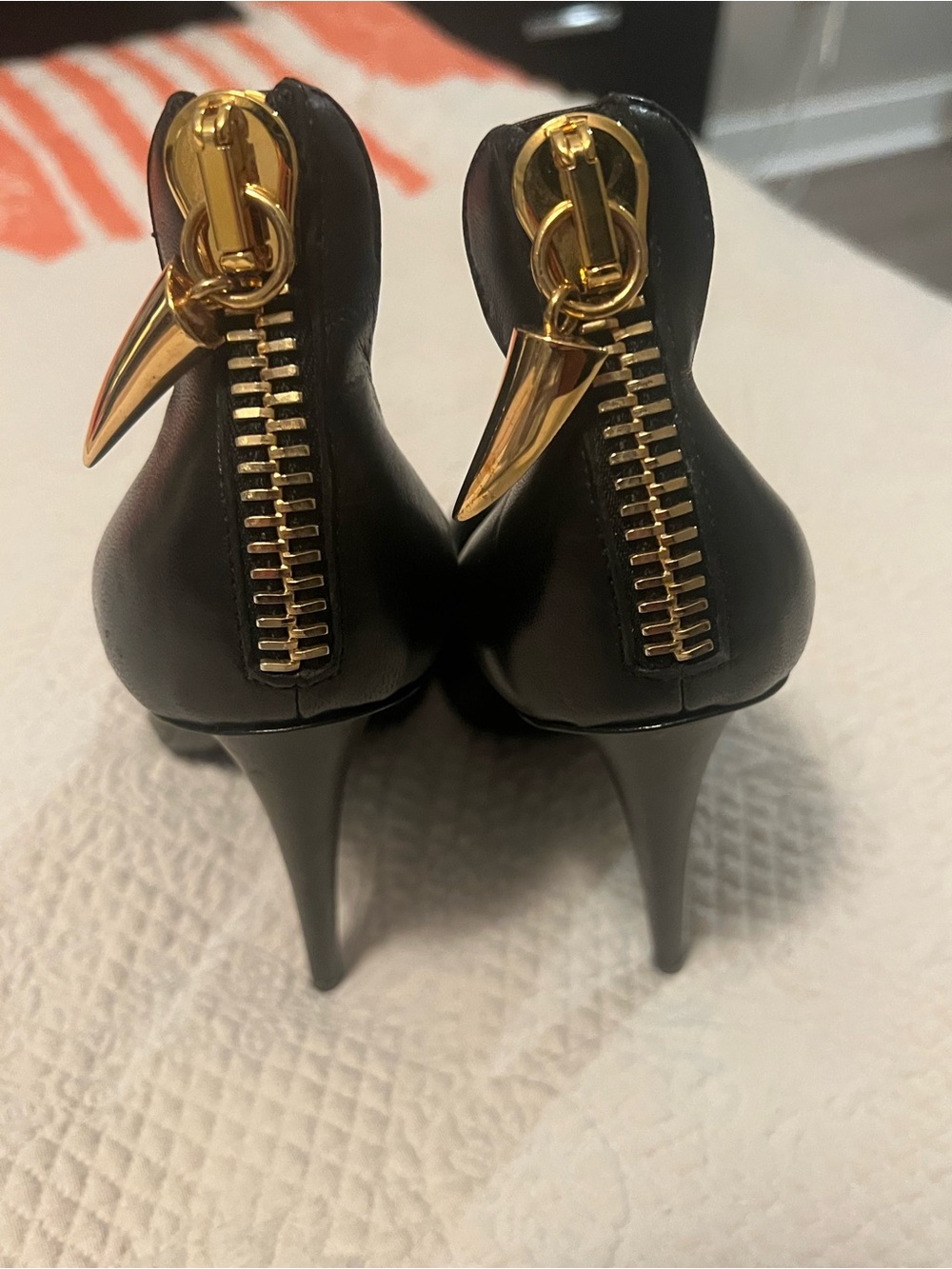 Black Leather Stiletto Heels with Gold Zip Accent